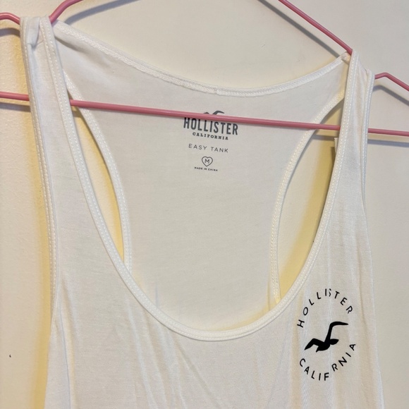 Hollister Easy Tank Racerback Stretch Flowy Tank Top Shirt White Blue Logo M NWT - Picture 2 of 3